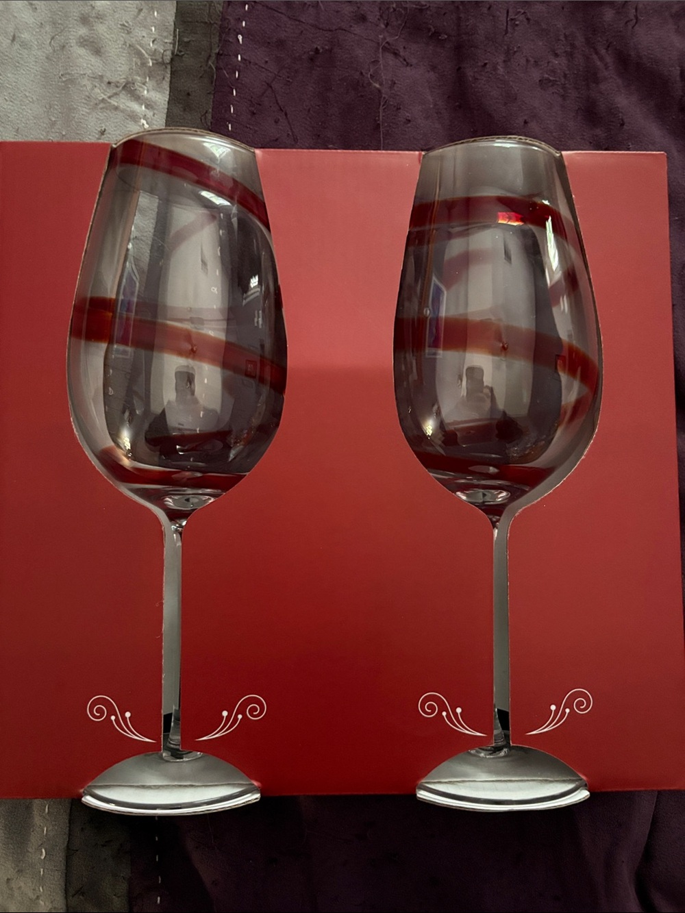 Set of Two Decorative Wine Glasses with Red Swirl